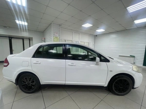 Седан Nissan Tiida 2010 года, 699000 рублей, Ачинск