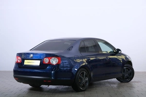 Седан Volkswagen Jetta 2010 года, 599000 рублей, Омск