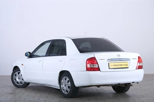 Седан Mazda Familia 2002 года, 289000 рублей, Омск