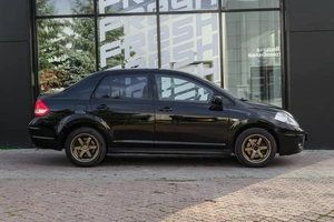 Седан Nissan Tiida 2010 года, 629000 рублей, Ульяновск