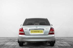 Седан Mazda Familia 2002 года, 299000 рублей, Кемерово