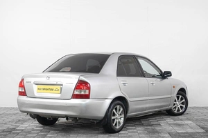 Седан Mazda Familia 2002 года, 299000 рублей, Кемерово