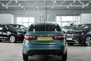 Седан Kia Rio 2013 года, 869000 рублей, Омск